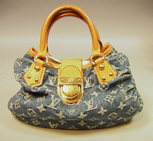 Authentic Louis Vuitton Denim Purse Hand Bag. St: Authentic Louis Vuitton Denim Purse Hand Bag. Stitched design. Leather.-- Dimensions: H: 10 inches: W: 10 inches: D: 7 inches --- Condition (General): Very Good Condition. Please contact us with speci