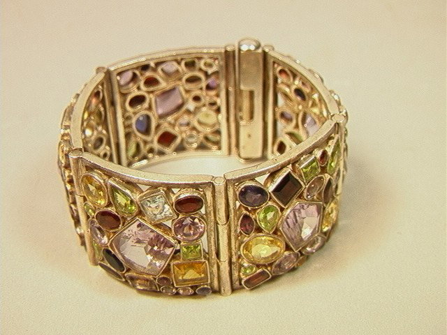 Elaborate Heavy Sterling Bracelet set with Semi P: Elaborate Heavy Sterling Bracelet set with Semi Precious Stones. Facet cut stones. Eye Catcher. Probably custom studio piece.-- Dimensions: H: 1.5 inches: W: 7.4 inches --- Condition (General): Very G