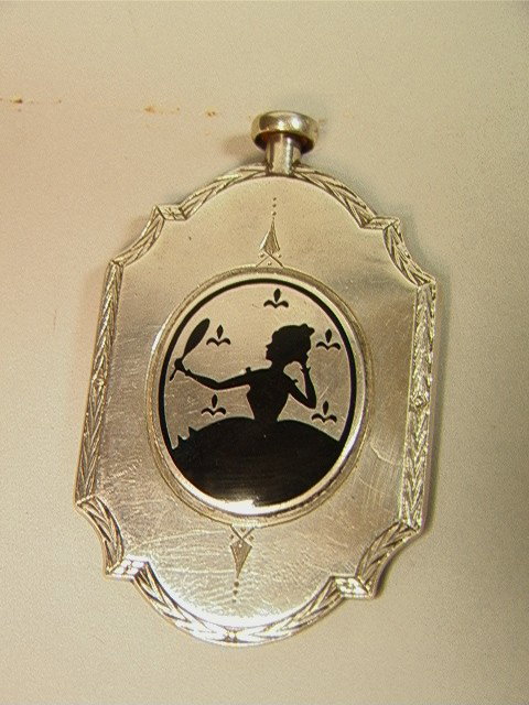Antique Art Deco Sterling Perfume Bottle with Dec: Antique Art Deco Sterling Perfume Bottle with Decoration of Lady with Mirror. Engraved edge design. -- Dimensions: H: 2.5 inches: W: 1.75 inches --- Condition (General): Very Good Condition. Please co
