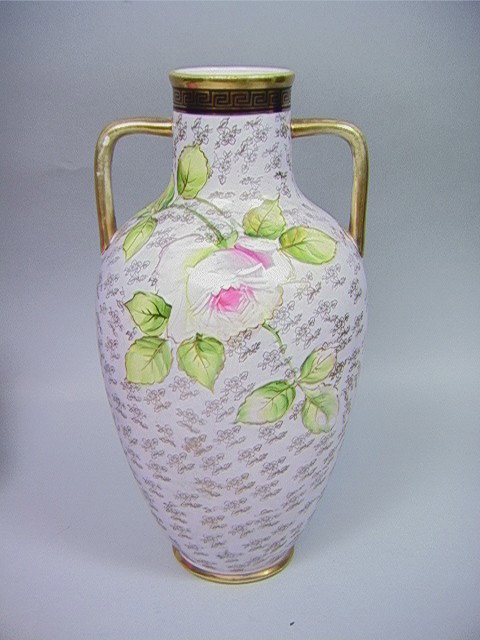Nippon Vase with Rose decoration.: Nippon Vase with Rose decoration.-- Dimensions: H: 11.25 inches: W: 8.25 inches --- Condition (General): Good condition. Wear to Gold handles Please contact us with specific questions about condition,