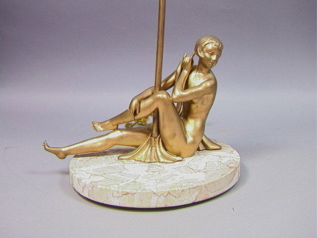 Art Deco Table lamp. Reclining Woman. Assembled w: Art Deco Table lamp. Reclining Woman. Assembled with added lamp portion. Marble base.-- Dimensions: H: 23.5 inches: W: 9.5 inches --- Please contact us with specific questions about condition, not vis