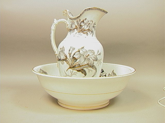 MINTONS English Pitcher & Bowl. Blue Transfer Des: MINTONS English Pitcher & Bowl. Blue Transfer Design with hand painted Gold Highlights. Marked.-- Dimensions: Image Size: --- Condition (General): 1" chip to underside of rim. Pitcher 15 x 8.5. Bowl 5