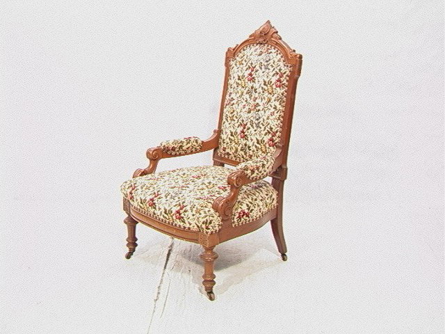 Victorian Walnut Parlor Chair with floral upholst: Victorian Walnut Parlor Chair with floral upholstery.-- Dimensions: H: 40 inches: W: 25 inches: D: 23 inches --- Condition (General): Very Good Condition. Wear to upholstery. Please contact us with sp