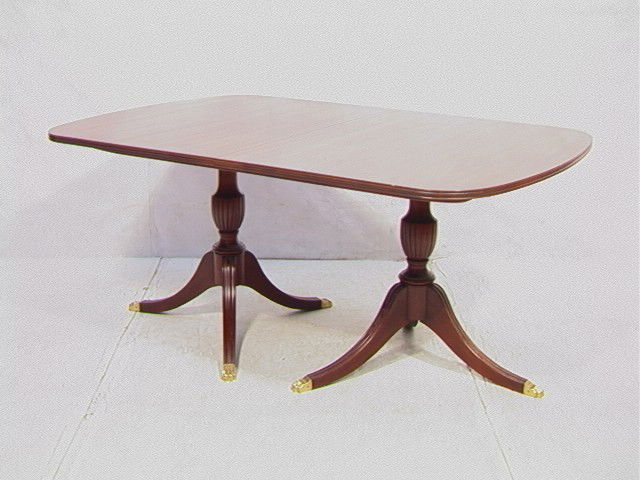 Henkel Harris Dining Table Mahogany with Urn Dunc: Henkel Harris Dining Table Mahogany with Urn Duncan Phyfe legs. Marked with tag. 4 leaves - 12 inches each-- Dimensions: --- Condition (General): Slight fading to top. Please contact us with specific