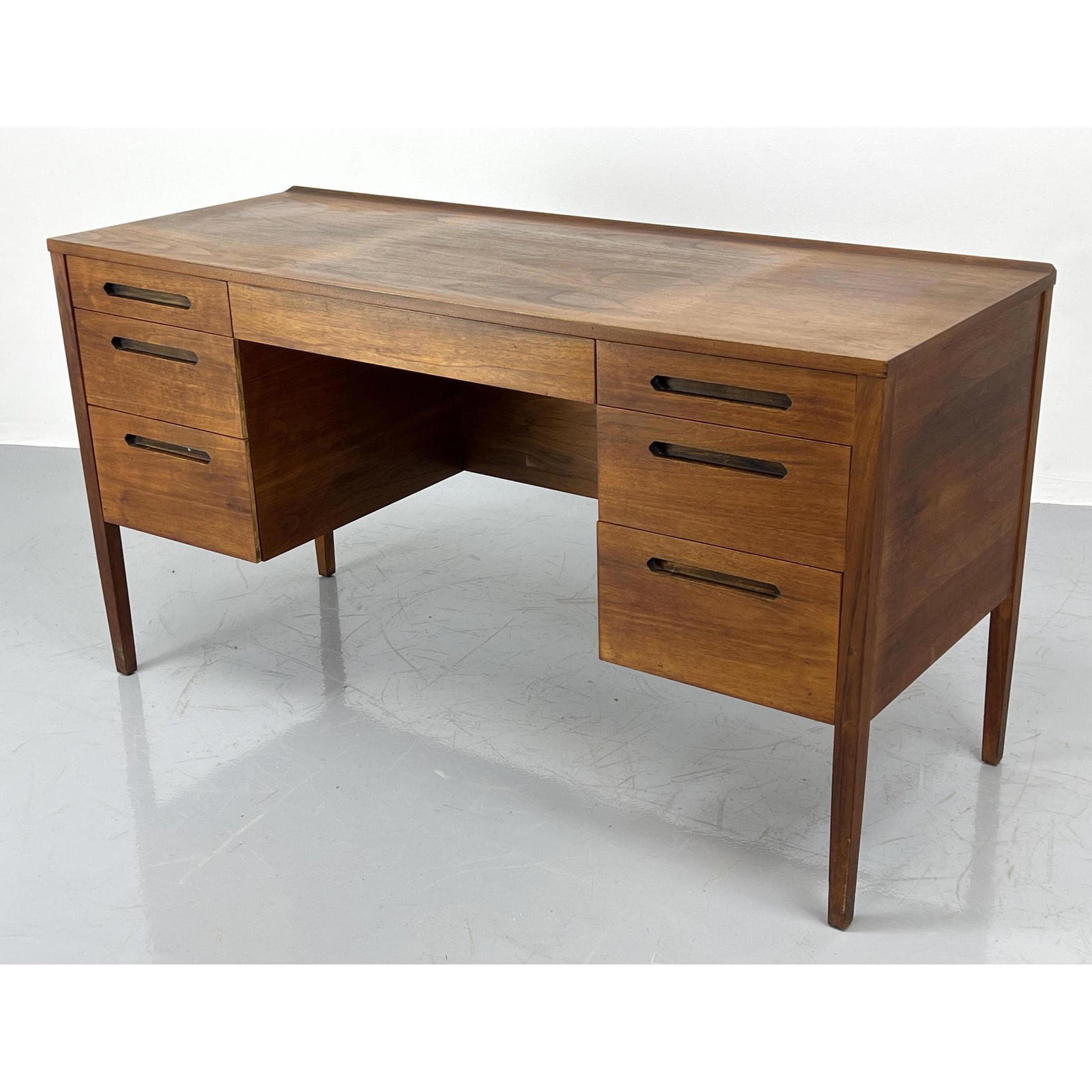 Modernist Desk. Inset pulls. Raised on legs. (1 of 11)