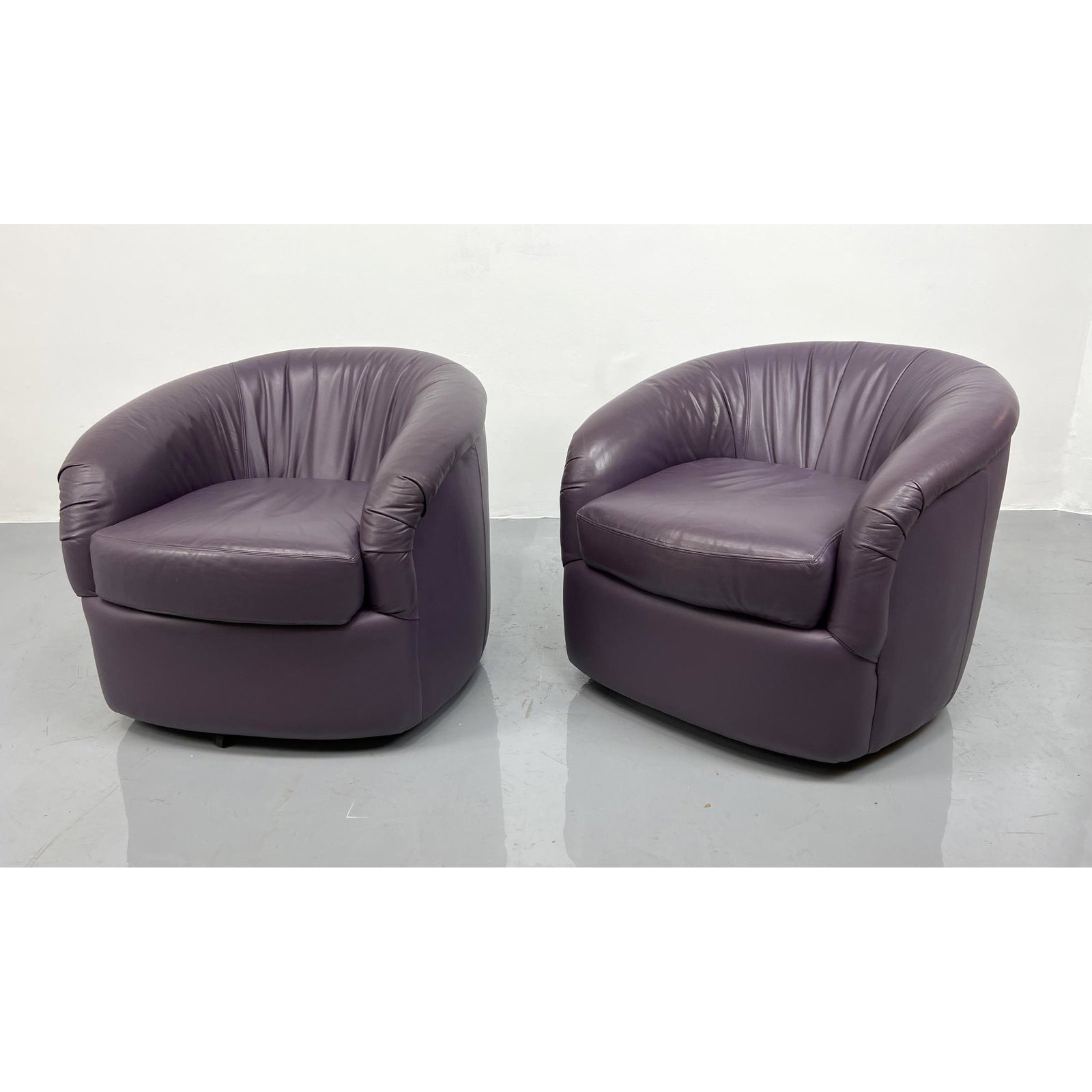 Pr CHOICE SEATING Purple Swivel Lounge Chairs #1. Leath: Pr CHOICE SEATING Purple Swivel Lounge Chairs #1. Leather Barrel Backs. Label. Dimensions: H: 27 inches: W: 32 inches: D: 34 inches ---