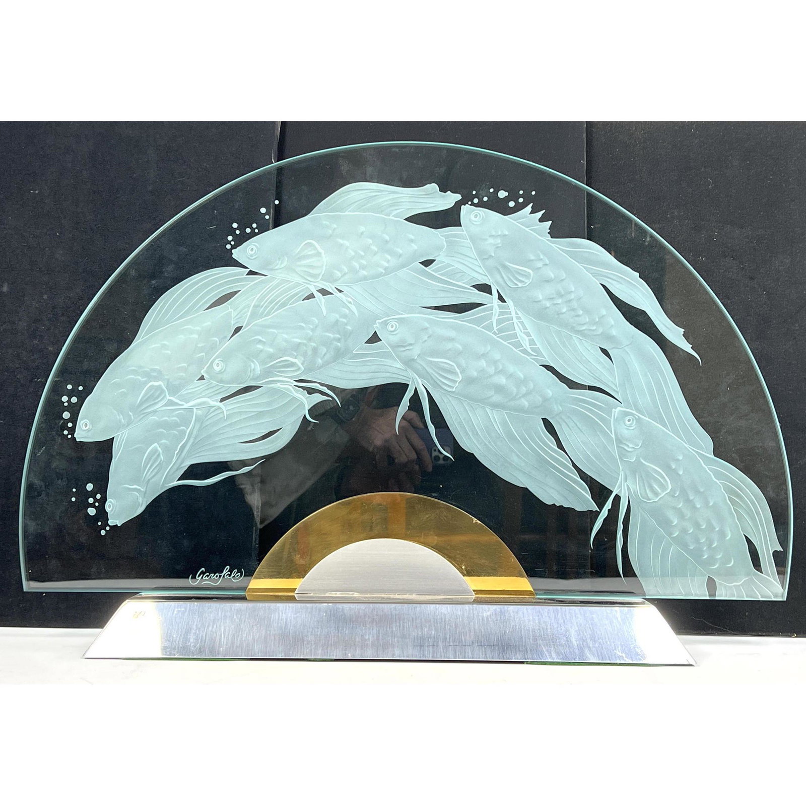GAROFALO Etched Cut Glass Table Sculpture. Etched desig: GAROFALO Etched Cut Glass Table Sculpture. Etched design of swimming fish. Signed. Dimensions: H: 20.5 inches: W: 29.5 inches: D: 6 inches ---