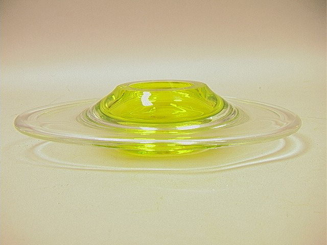 Small Neil Small Saturn Glass Dish. Clear and gr: Small Neil Small Saturn Glass Dish. Clear and green.-- Dimensions: H: 2.25 inches: W: 10.25 inches: D: 7.5 inches --- Condition (General): Very Good Condition. Please contact us with specific question