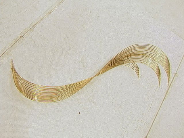 Signed CURTIS JERE Gold Wire SWISH Wall Sculpture: Signed CURTIS JERE Gold Wire SWISH Wall Sculpture. Signed and dated 198?.-- Dimensions: H: 52 inches: W: 16 inches: D: 3 inches --- Condition (General): Very Good Condition. Some minor finish losses.