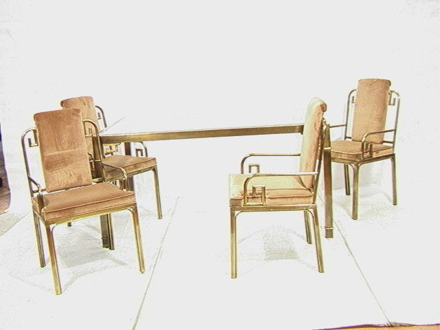 MASTERCRAFT Brass Asian Dining Table & Chairs. As: MASTERCRAFT Brass Asian Dining Table & Chairs. Asian Inspired Glass Top Dining Table. Set of 4 Arm Chairs with Asian Scroll Motif. Upholstered seats and backs. Not marked.-- Dimensions: --- Condition