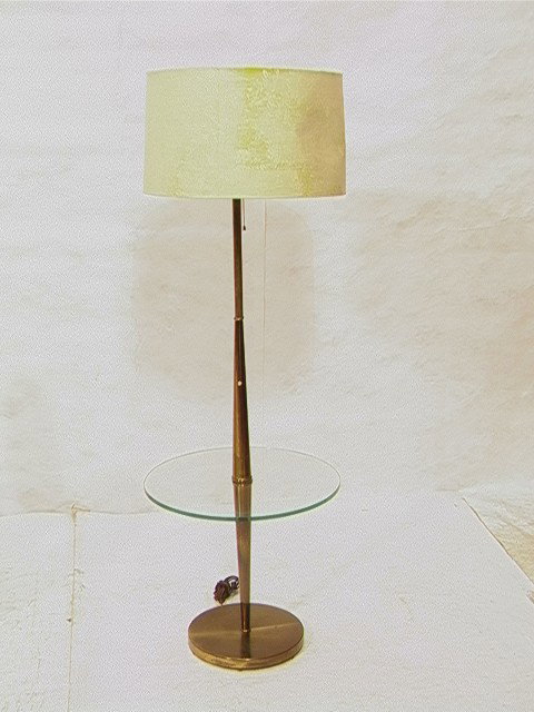 Brass and Glass Mid Century Table Floor Lamp.: Brass and Glass Mid Century Table Floor Lamp. -- Dimensions: H: 55 inches: W: 18 inches --- Condition (General): Overall blemishes and pitting to brass. Glass in Good Condition. Please contact us with