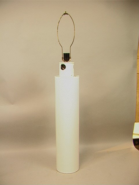 70s Modern White Enamel Table Lamp. Large Column: 70s Modern White Enamel Table Lamp. Large Column Form with unusual bulb configuration. Unmarked.-- Dimensions: H: 32 inches --- Condition (General): Some paint loss to enamel collar. Please contact us