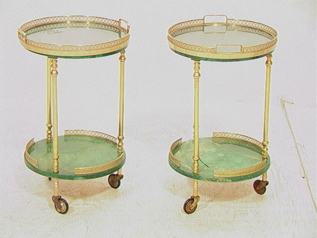 Pr ALDO TURA Rolling Tray Tables. Brass Trim wi: Pr ALDO TURA Rolling Tray Tables. Brass Trim with Green Leather Goatskin Table Tops. Both labeled. 2 Pcs-- Dimensions: H: 21 inches: W: 13 inches --- Condition (General): Both lower shelves missing mo