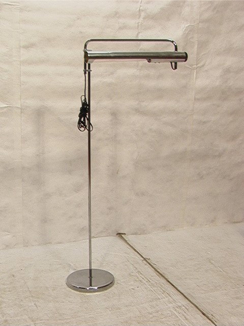 Modernist Adjustable Arm Floor Lamp. Cylinder lig: Modernist Adjustable Arm Floor Lamp. Cylinder light on chrome tube base. -- Dimensions: H: 49 inches --- Condition (General): Missing an end cap. Please contact us with specific questions about condit