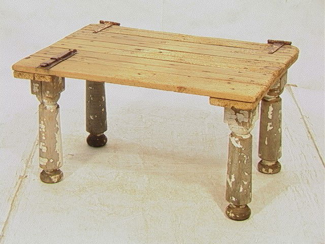 Constructed Vintage Barn Door Side Table. Slatte: Constructed Vintage Barn Door Side Table. Slatted Barn Door with Iron Hinges supported by Four Wood Spindle Legs. Paint Remnants on Legs. -- Dimensions: H: 19 inches: W: 36 inches: D: 26 inches --- Co