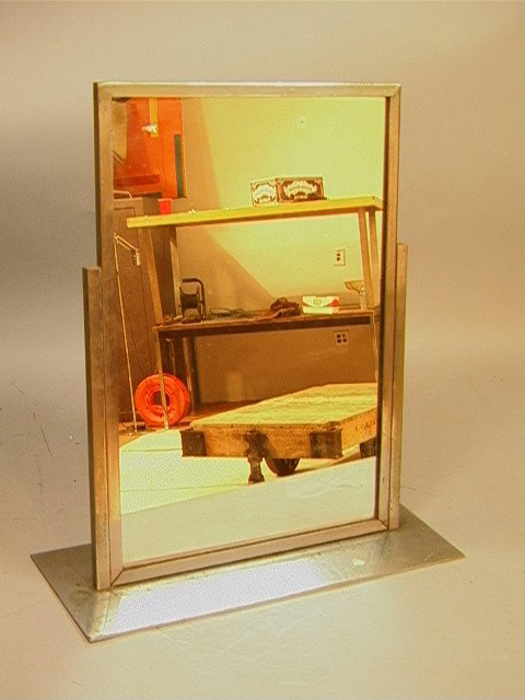 Industrial Table Counter Top Mirror. Steel Frame: Industrial Table Counter Top Mirror. Steel Frame Angled Form.-- Dimensions: H: 18 inches: W: 16 inches: D: 6 inches --- Condition (General): Small chip to top left corner of mirror. Please contact us 