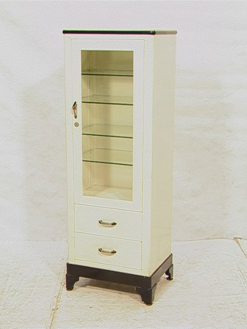 Vintage Industrial Steel Doctor Medical Cabinet.: Vintage Industrial Steel Doctor Medical Cabinet. Painted Steel with glass front door. Glass shelves. White Paint with Black Trim. EDW. A. MERKEL, Maker.-- Dimensions: H: 60 inches: W: 20.5 inches: D: 