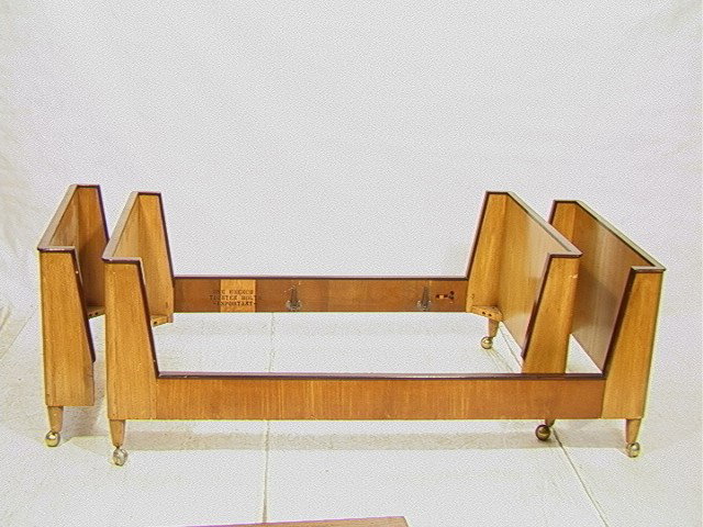 Pr. German Modernist style twin single beds. Blon: Pr. German Modernist style twin single beds. Blond Mahogany with dark mahogany trim. Austrian Biedermeier style. 2 PCS.-- Dimensions: H: 31 inches: D: 42 inches: L: 81.5 inches --- Condition (General)