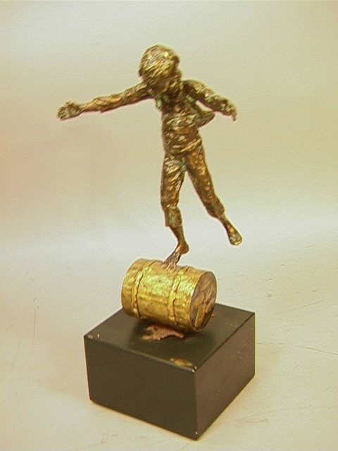 C Jere 71 Bronze Sculpture of Boy on Barrel on wo: C Jere 71 Bronze Sculpture of Boy on Barrel on wood base. Signed and dated.-- Dimensions: H: 15 inches: W: 17.5 inches: D: 6 inches --- Condition (General): Nicks to paint on wood base. Please contact