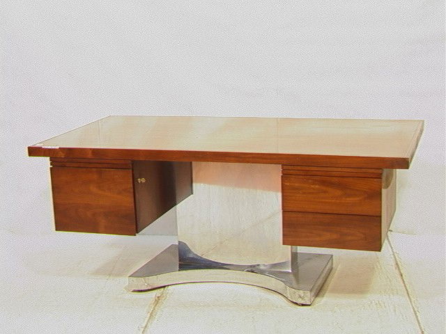 Warren Platner Style Desk. Walnut on chrome lamin: Warren Platner Style Desk. Walnut on chrome laminate base with 2 drawers.-- Dimensions: H: 29.5 inches: W: 71 inches: D: 36 inches --- Condition (General): Some dings and scratches to wood. Warped woo