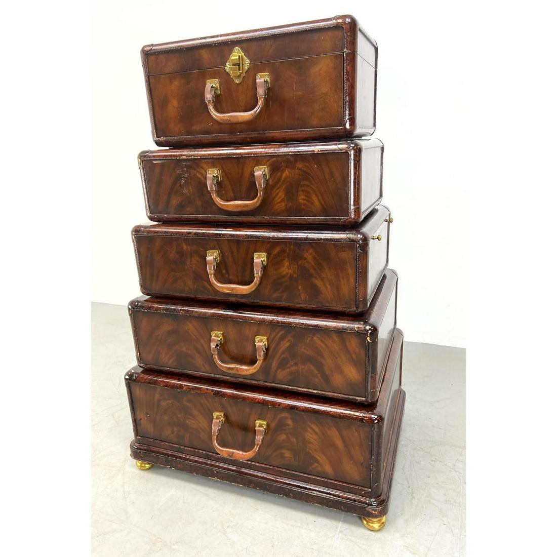Maitland Smith 5pc wood and leather faux luggage dresse: Maitland Smith 5pc wood and leather faux luggage dresser. Each piece is separate with its own individual drawer. Unsigned but remnants of glue where label was Dimensions: H: 50.5 inches: W: 31 inches: