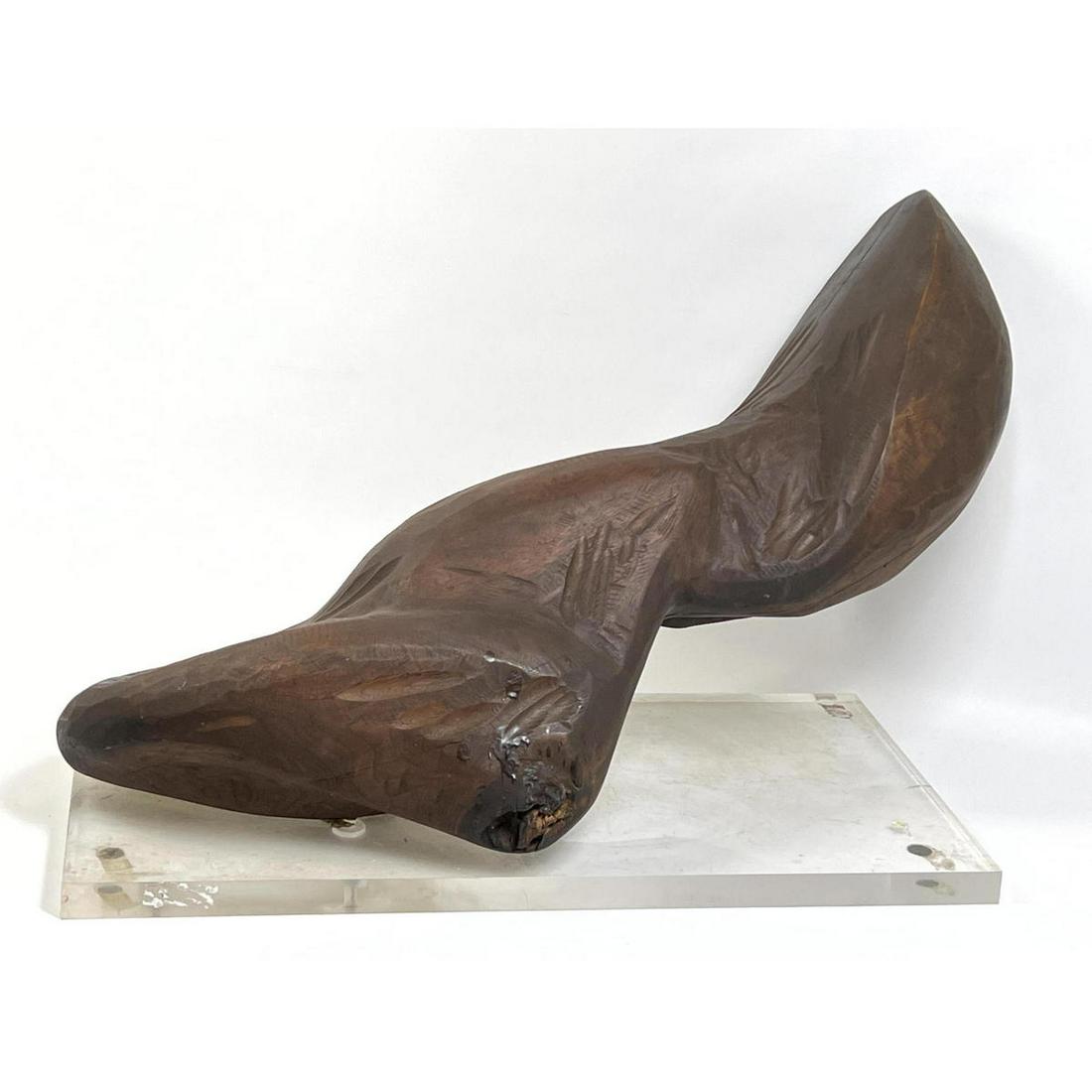 Carved wood biomorphic sculpture on lucite base: Carved wood biomorphic sculpture on lucite base Dimensions: H: 17 inches: W: 28 inches: D: 12 inches ---