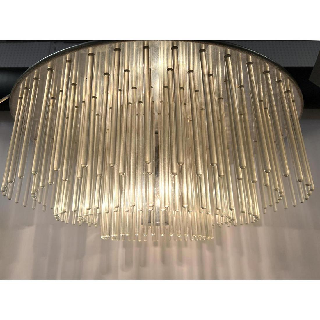 Lightolier drop prism chandelier. 23 inch diameter. Sig: Lightolier drop prism chandelier. 23 inch diameter. Signed with label. Dimensions: H: 8 inches: W: 23 inches: D: 23 inches ---