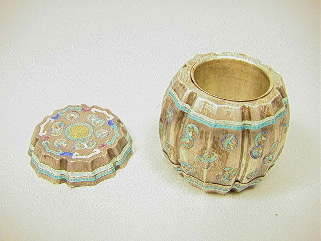 Chinese Silver and Enamel drum Form Tea Caddy Box: Chinese Silver and Enamel drum Form Tea Caddy Box. Floral design decorated with birds and bats. Removable Inner Cup. Interior cup appears to be marked.-- Dimensions: H: 2.5 inches: W: 2.75 inches--- W