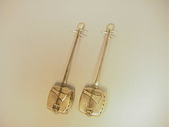 Sterling Asian Instrument Salt & Pepper Shakers.: Sterling Asian Instrument Salt & Pepper Shakers. Marked Silvercraft Sterling. -- Dimensions: --- Weight: .9 Troy ozs. ---- --- US Shipping charge: $14