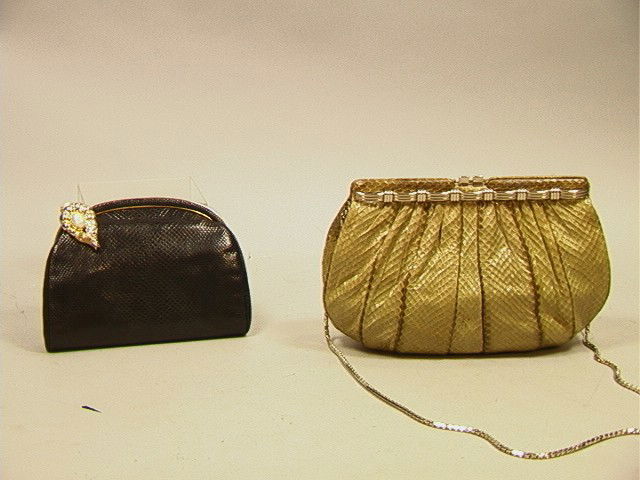 2 JUDITH LEIBER Handbags Purses. (1) Pale Green S: 2 JUDITH LEIBER Handbags Purses. (1) Pale Green Snakeskin Handbag with Silvertone accent trim & clasp. (2) Black Lizard Purse with Shrimp Rhinestone Clasp. Both marked.-- Dimensions: H: 7.5 inches: W: