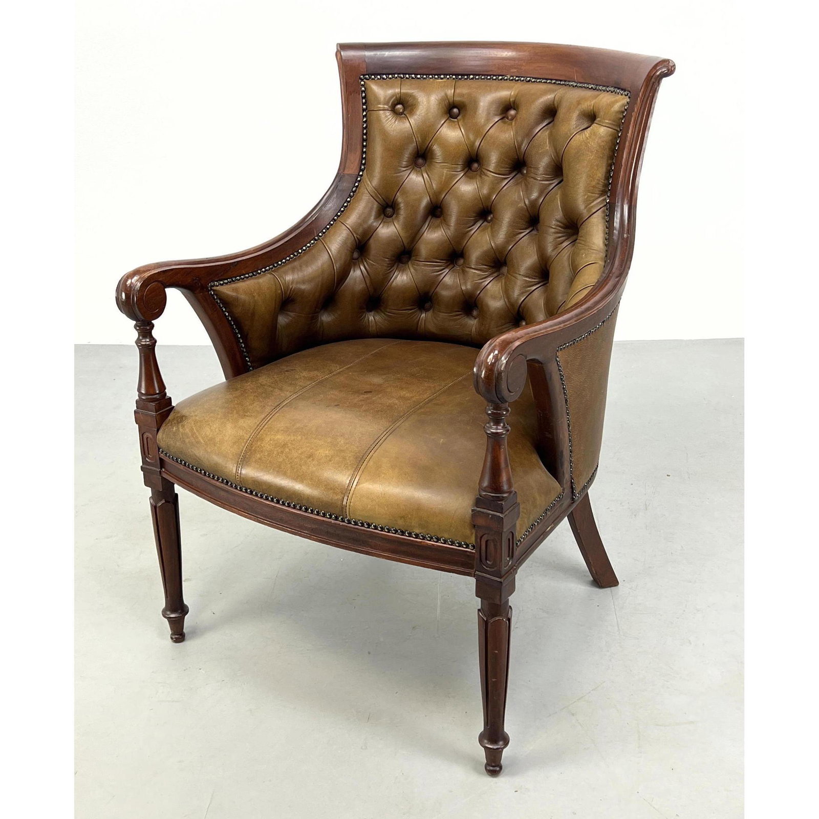 Tufted Leather Vintage Arm Chair. Brass studded trim. (1 of 9)