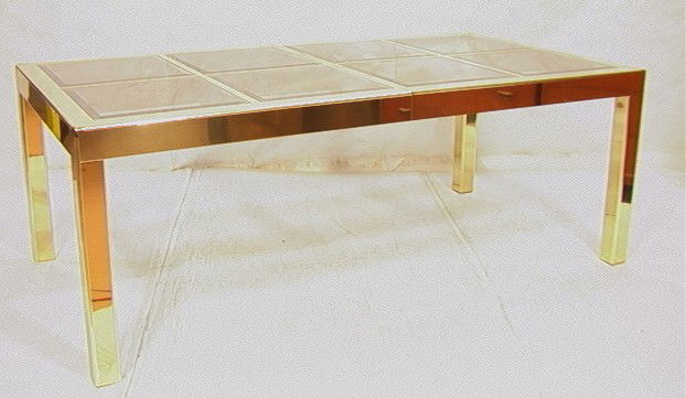 Mastercraft Dining Table. Brass Laminate Frame w: Mastercraft Dining Table. Brass Laminate Frame with Inset Beveled Glass. Two 19.5in Leaves. Smoked glass.-- Dimensions: H: 29.5 inches: W: 80.75 inches: D: 42.5 inches --- Condition (General): Very Go