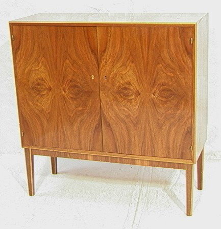 Swedish Modern Bar Cabinet Server. Two doors wit: Swedish Modern Bar Cabinet Server. Two doors with fitted interior. Mirrored back.-- Dimensions: H: 39.5 inches: W: 39.25 inches: D: 15 inches --- Condition (General): Missing one escutcheon. Some surf
