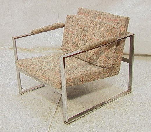 Milo BAUGHMAN Style Flat Chrome Lounge Chair. U: Milo BAUGHMAN Style Flat Chrome Lounge Chair. Unmarked.-- Dimensions: H: 26 inches: W: 28 inches: D: 30.25 inches --- Condition (General): Missing seat cushion. Metal with corrosion and losses. Please