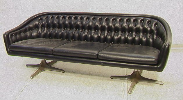 Chromecraft Modernist Sofa Couch. Tufted Black V: Chromecraft Modernist Sofa Couch. Tufted Black Vinyl on two quad leg pedestal bases. 3 cushion seat.-- Dimensions: H: 28 inches: W: 81 inches: D: 28 inches --- Condition (General): Very Good Condition