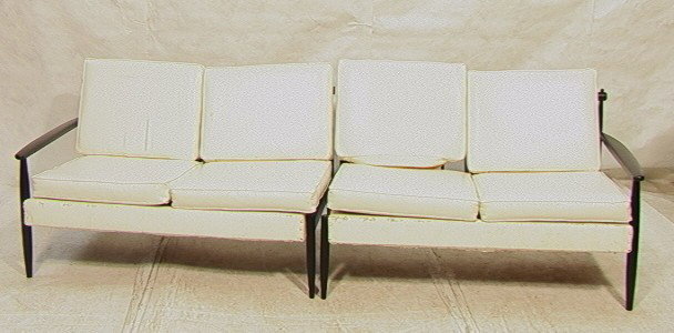 2 Section Danish Modern Sofa Couch. Black eboniz: 2 Section Danish Modern Sofa Couch. Black ebonized frame. Spindle Back.-- Dimensions: H: 31 inches: W: 47 inches: D: 29 inches --- Condition (General): Wood frame is clean. Upholstery is distressed. P