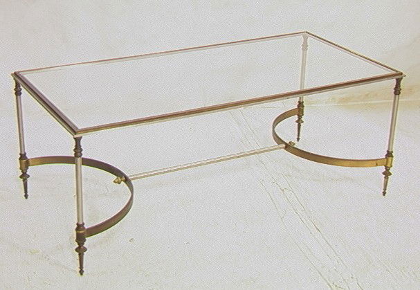 MAISON JANSEN style Coffee Table. Brass & Chrome: MAISON JANSEN style Coffee Table. Brass & Chrome with Inset Glass Top. French Directoire style. Acorn finials on stretchers. -- Dimensions: H: 16 inches: W: 42 inches: D: 20 inches --- Condition (Gene