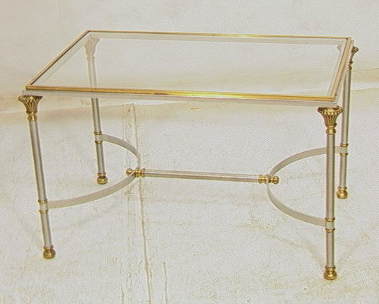 MAISON JANSEN style Side Occasional Table. Brass: MAISON JANSEN style Side Occasional Table. Brass & Chrome with Inset Glass Top. French Directoire style. Legs have Floral Caps. -- Dimensions: H: 17 inches: W: 29 inches: D: 19 inches --- Condition (G