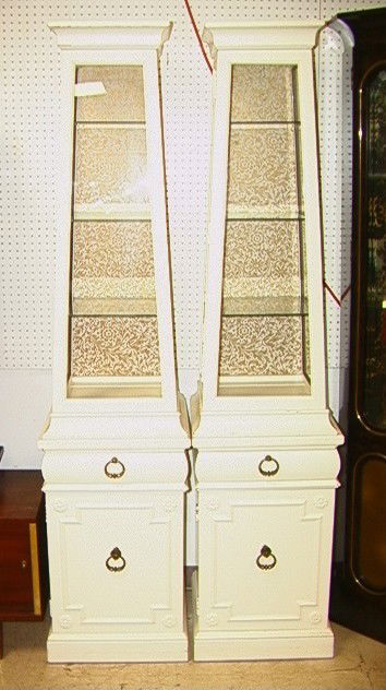 Pr Decorator Display Cabinets. Glass Obelisk Form: Pr Decorator Display Cabinets. Glass Obelisk Form Tops. Door and Drawer Lower Section. Painted White. 2 Part Cabinets.-- Dimensions: H: 79.5 inches: W: 18 inches --- Condition (General): Losses & crac