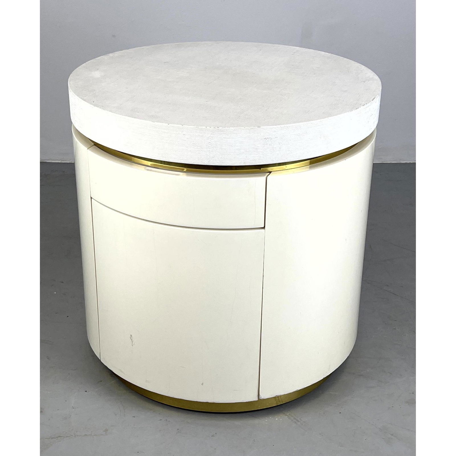 Springer style Round Side Table Cabinet. Grass cloth top over lacquered cabinet. Brass trim. (1 of 12)