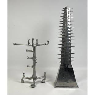 2pcs Aluminum Sculpture. Donald Drumm stand and ARTHUR COURT Sawfish: 2pcs Aluminum Sculpture. Donald Drumm stand and ARTHUR COURT Sawfish Dimensions: H: 24 inches: W: 7 inches ---