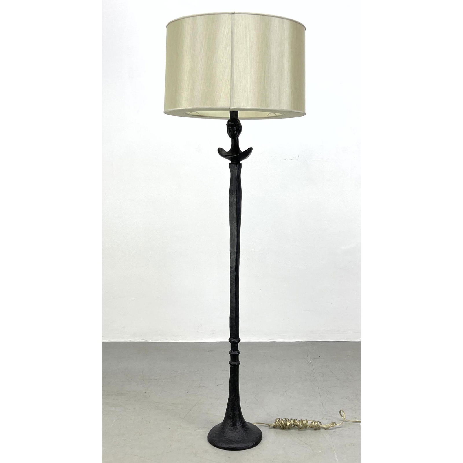 style Cast Iron Figural Floor Lamps. "Tete de Femme" form