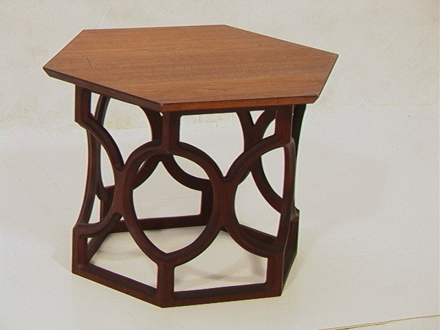 HARVEY PROBBER style Hexagonal Side Table. Open w: HARVEY PROBBER style Hexagonal Side Table. Open work Base. Six sided Walnut Top. Unmarked.-- Dimensions: H: 16 inches: W: 24 inches: D: 34.5 inches --- Condition (General): 3.53.5" scratch to top. Fil