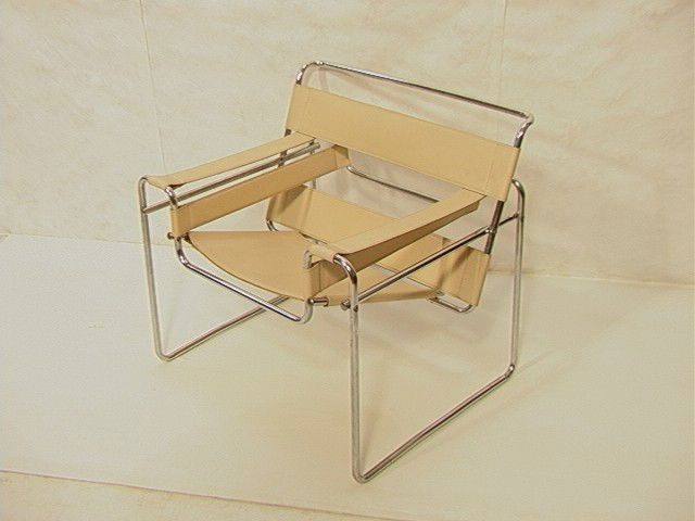 MARCEL BREUER design Wassily Chair. Cream Leather: MARCEL BREUER design Wassily Chair. Cream Leather Upholstery. Unmarked.-- Dimensions: H: 29.25 inches: W: 30.5 inches: D: 26.5 inches --- Condition (General): Clean. Chrome needs minor polishing. Plea