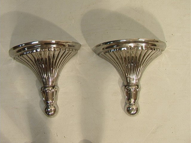 Pr Aluminum Fluted Form Wall Sconces Brackets. La: Pr Aluminum Fluted Form Wall Sconces Brackets. Large Semi Circle Top.-- Dimensions: H: 16 inches: W: 16.5 inches: D: 8.5 inches --- Condition (General): Some spots to metal. Please contact us with spe