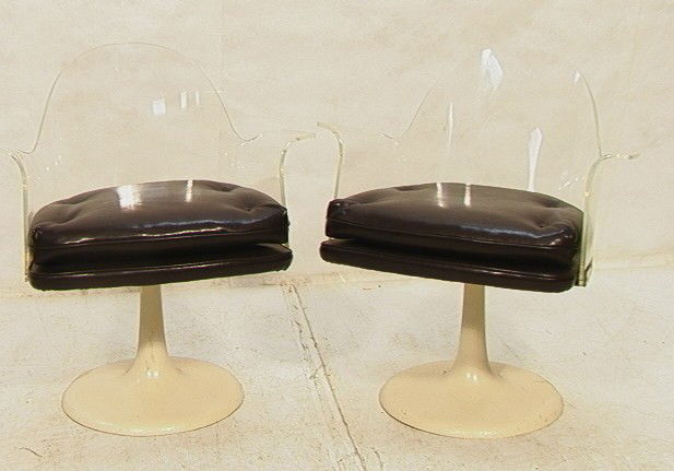 Pr 70's Modern Lucite Pedestal Arm Chairs. Brown: Pr 70's Modern Lucite Pedestal Arm Chairs. Brown Vinyl Cushions.-- Dimensions: H: 30.5 inches: W: 28 inches: D: 20 inches --- Condition (General): Pedestal Repainted White. Overall Scratches. One has