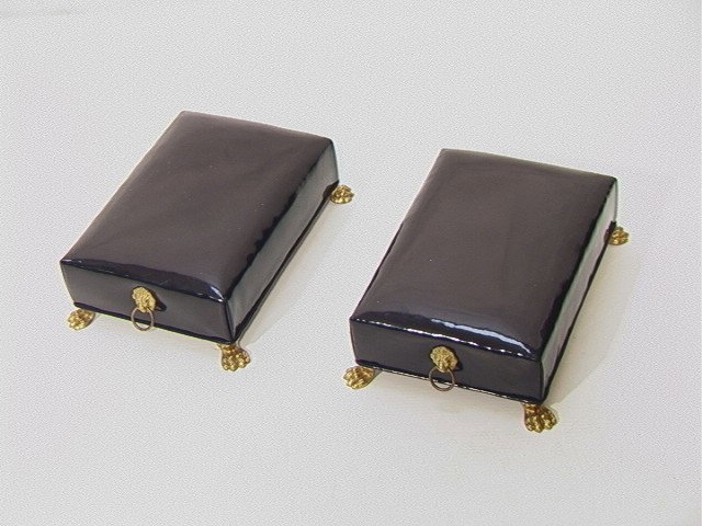 Pair Decorator Empire Style Small Footstools. Bl: Pair Decorator Empire Style Small Footstools. Black Vinyl with Brass paw feet. Lion head handles. -- Dimensions: H: 4.25 inches: W: 14 inches: L: 10 inches --- Condition (General): Some minor blemishe