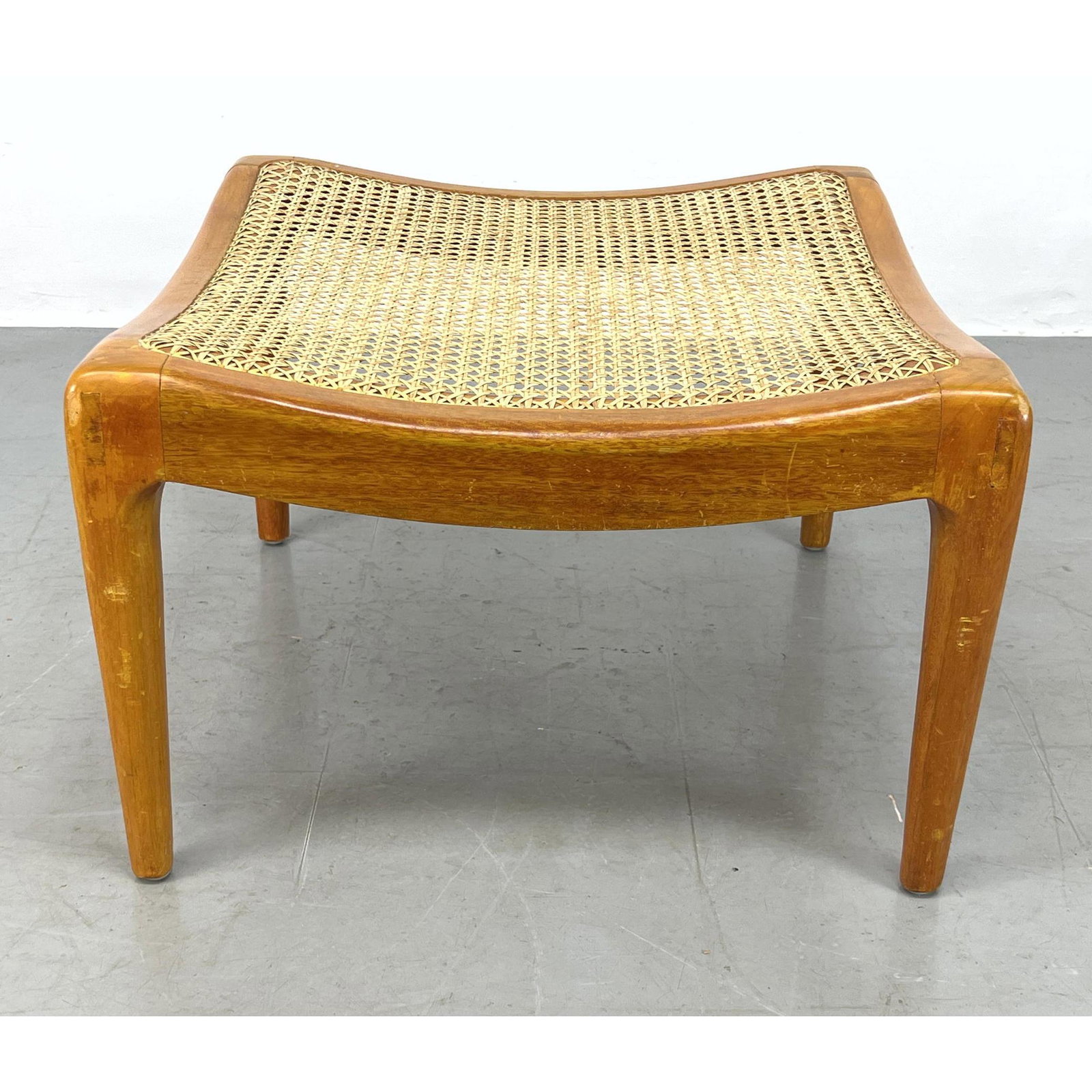 Woven Caned Concave Stool Bench.: Woven Caned Concave Stool Bench. Dimensions: H: 16 inches: W: 25 inches: D: 25 inches ---