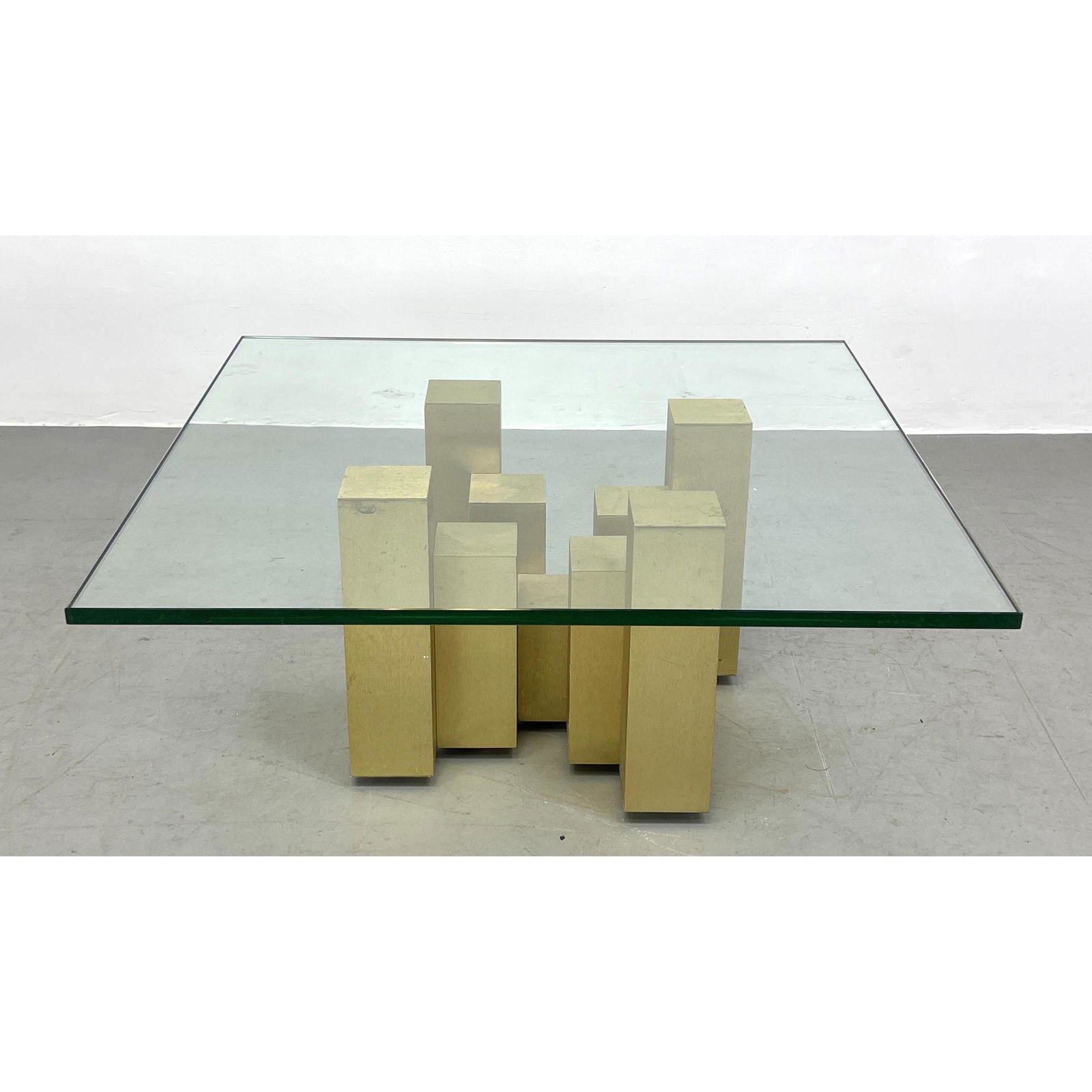Brass Tone Architectural Base Coffee Table. Glass Top rests on Various Height Square Columns. Evans (1 of 9)