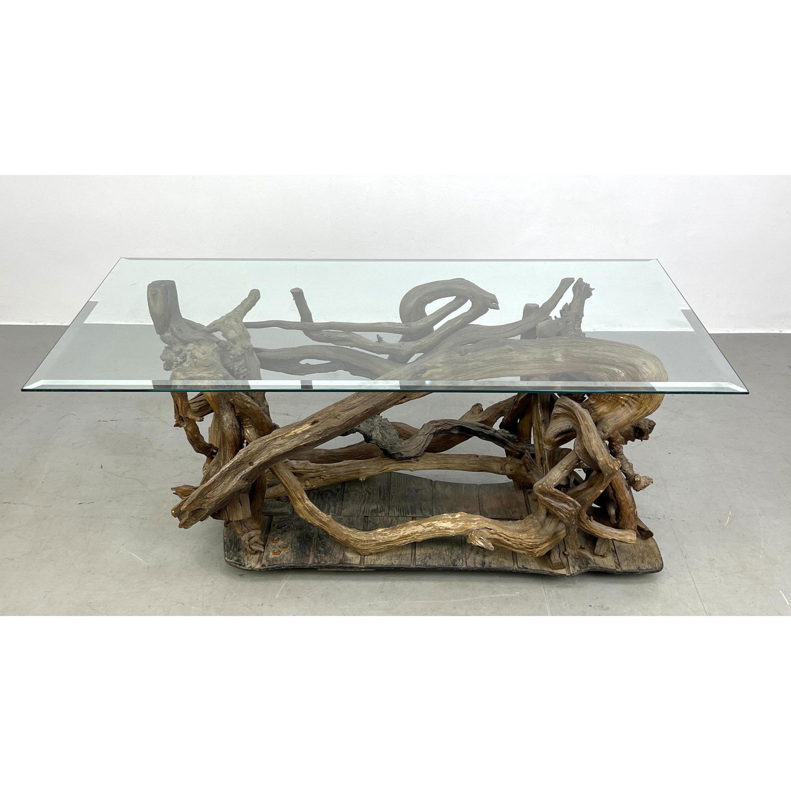 Organic Driftwood Glass Top Coffee Table. Assembled driftwood on rustic wood base. On wheels. (1 of 13)